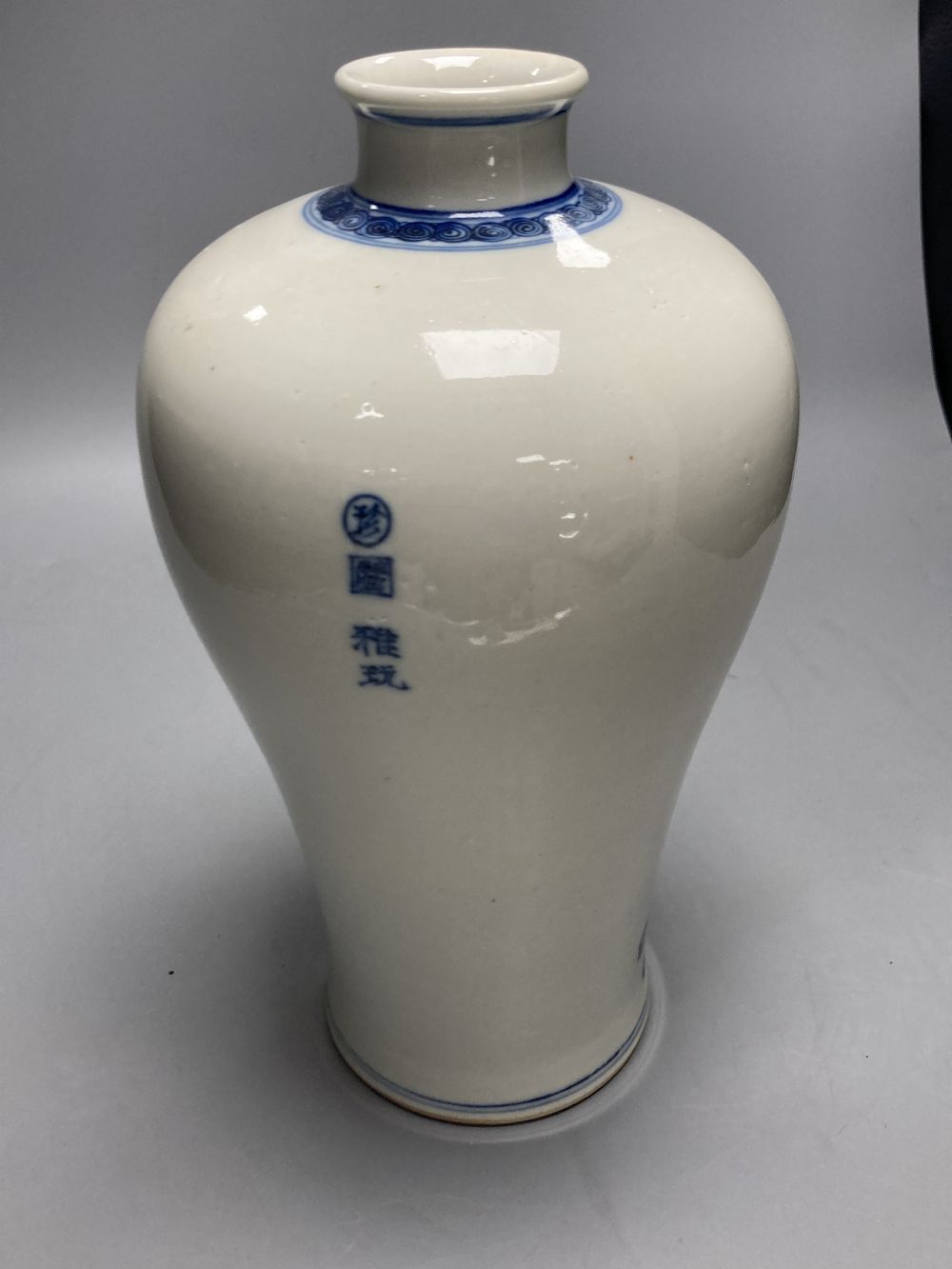 A Chinese blue and white figural vase, height 30cm